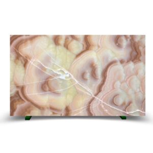 Honey onyx displays swirling patterns of amber and cream hues, showcasing its unique natural beauty and texture.