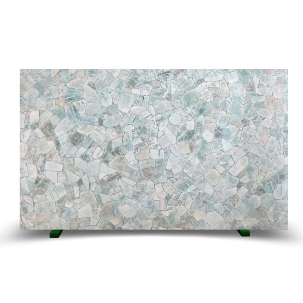 Textured mosaic in soft blue and white hues, showcasing the elegance of Roman Blue's refined color palette.