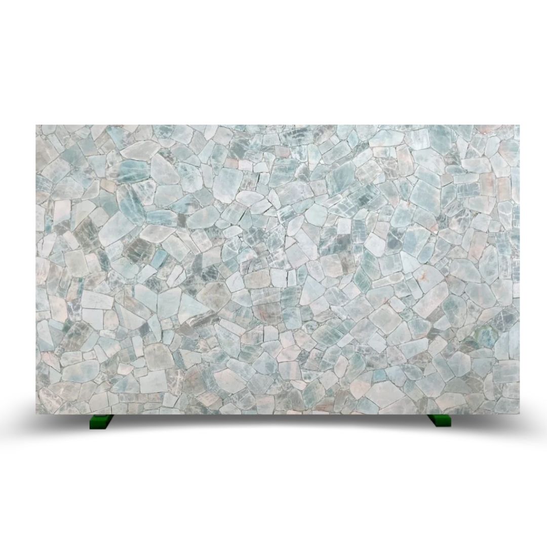 Textured mosaic in soft blue and white hues, showcasing the elegance of Roman Blue's refined color palette.